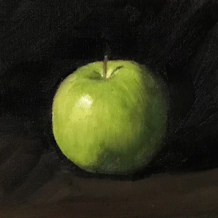 Green apple painted with oil paints