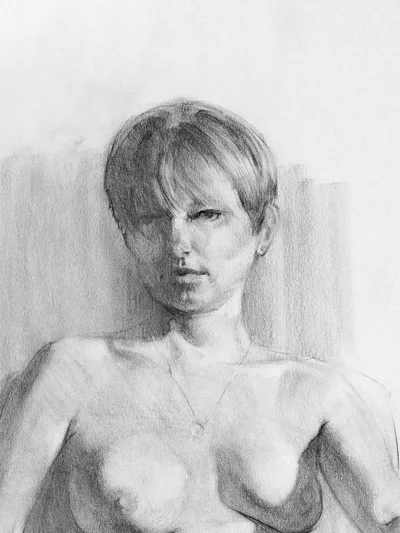 Head close-up of a figure drawing in charcoal