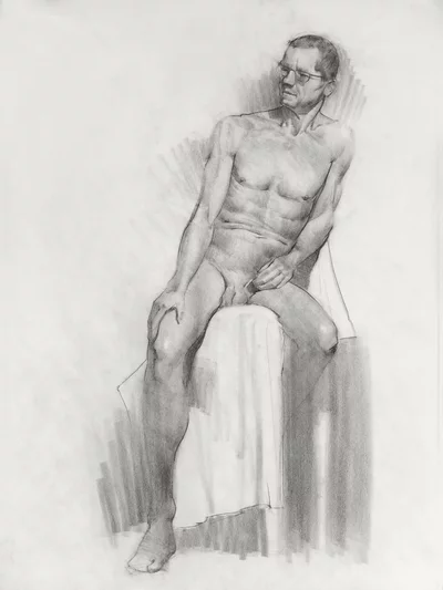 charcoal drawing of a sitting man