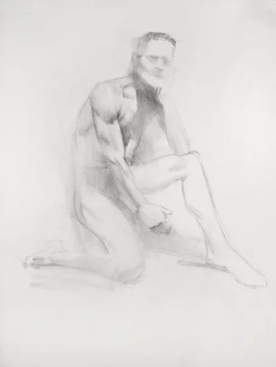 charcoal drawing of crouching man
