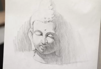Kohlezeichnung einer Buddha Büste